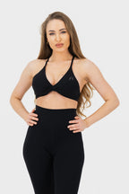 Woman is wearing a black top