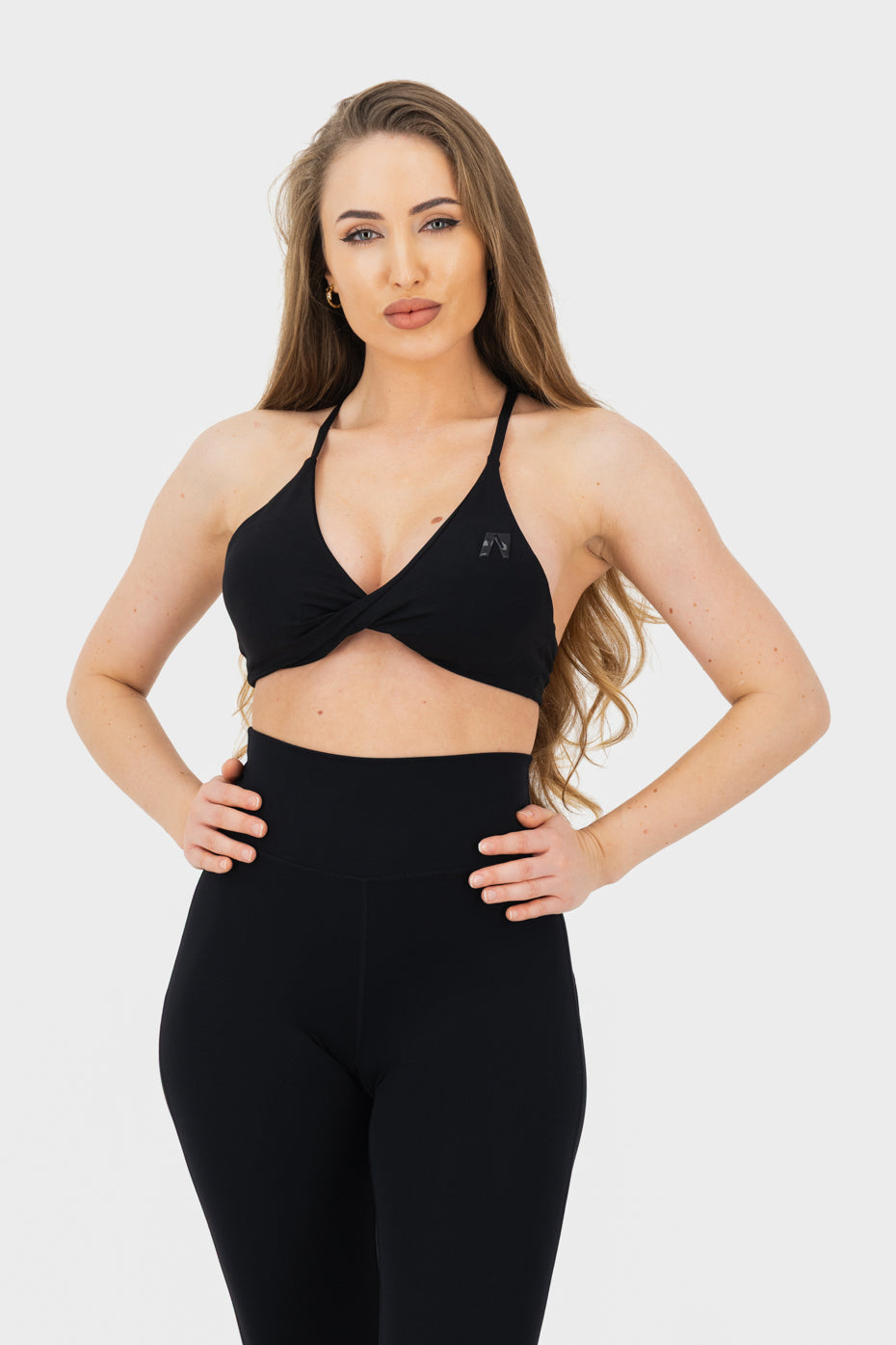 Woman is wearing a black top